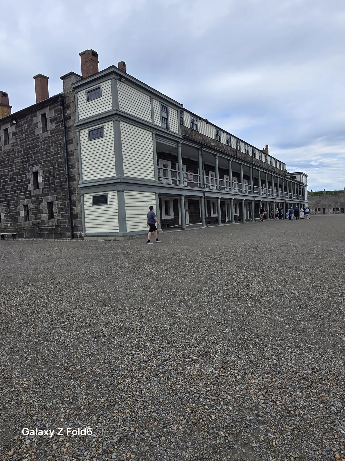 the cruise hq long two storey barracks with a veranda along the parade square at halifax citadel