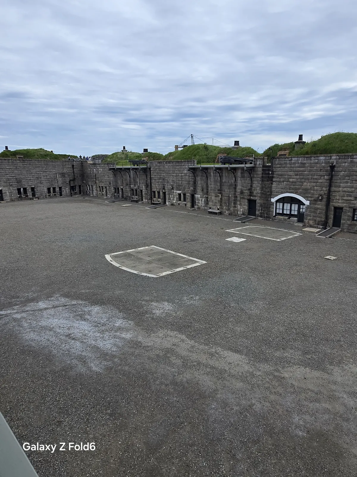 the cruise hq wide view of the parade square and grass topped casemates at halifax citadel