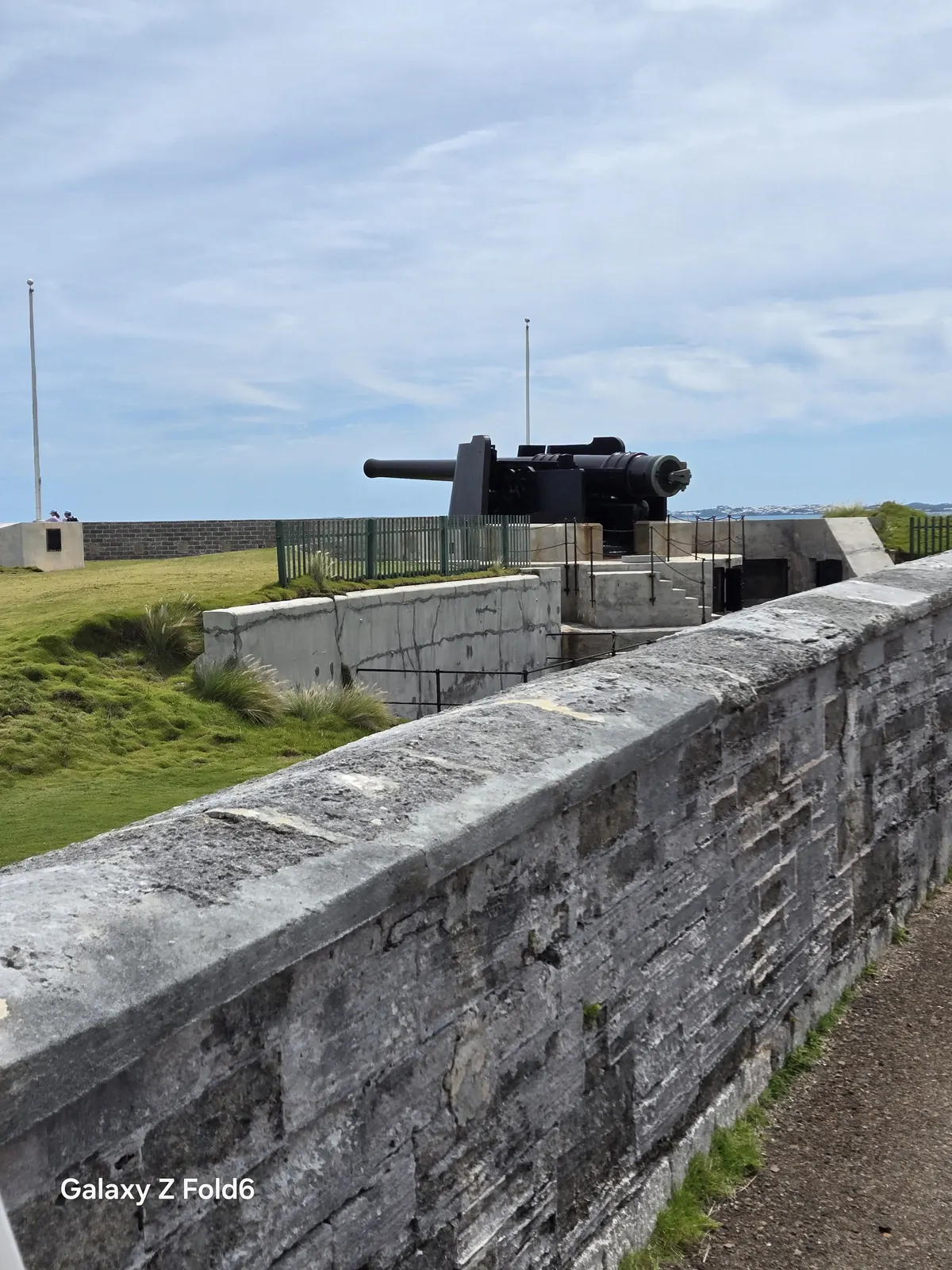 the cruise hq large cannon on the stone ramparts of the keep at royal naval dockyard bermuda